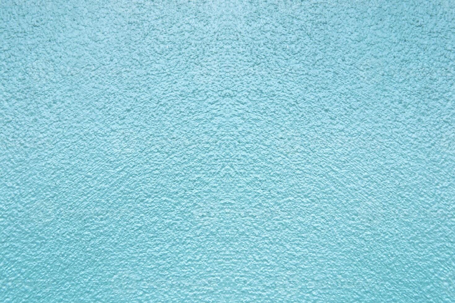 Textured Blue Surface with Subtle Patterns Creating a Calm and Serene Background for Design and Creative Projects photo
