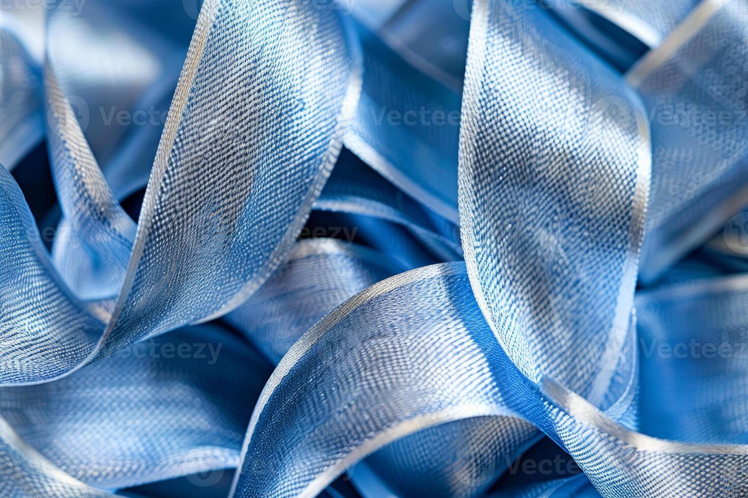Blue ribbon weaving and curling in abstract design photo