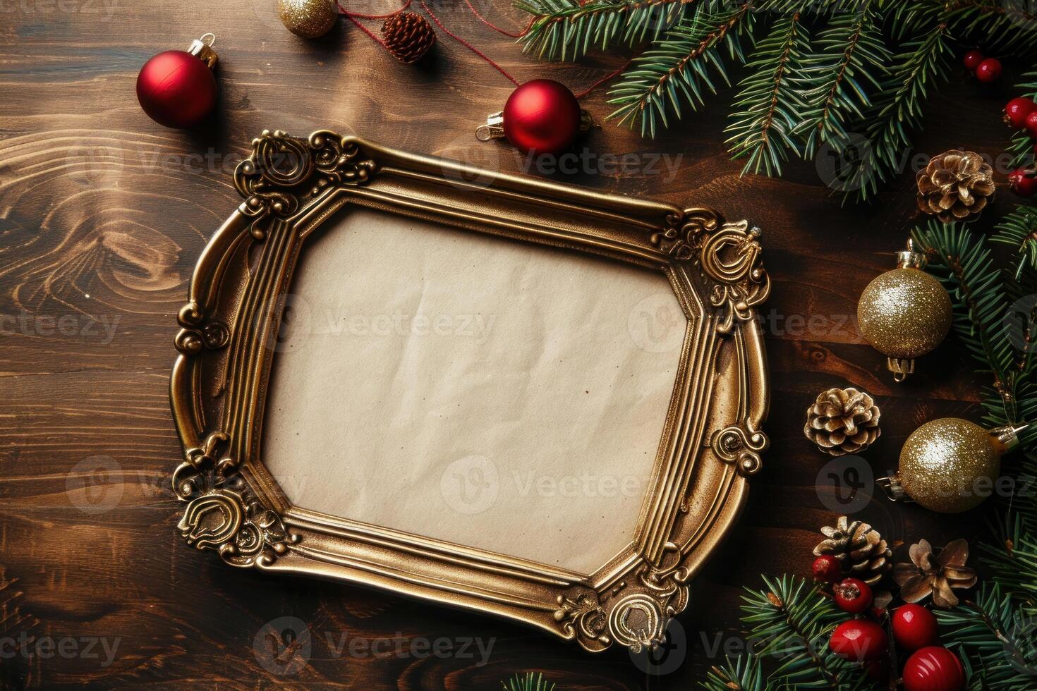 Christmas frame lying on wooden desk surrounded by ornaments and pine branches photo