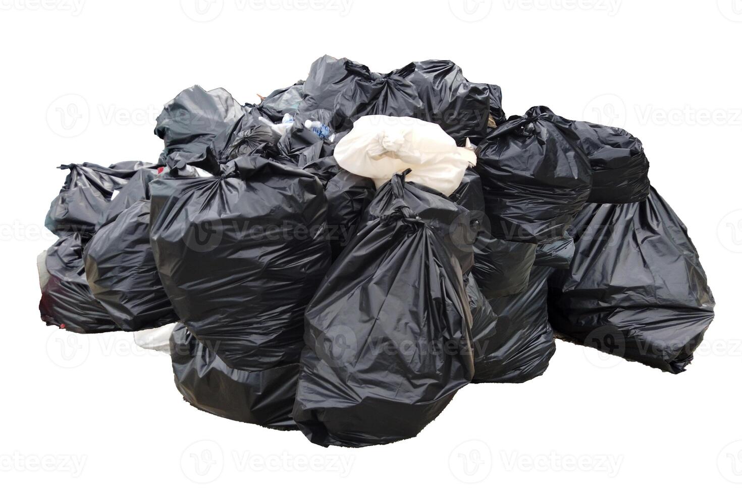 Pile of Black Garbage Bags Isolated on White Background for Waste Management and Recycling Concepts photo