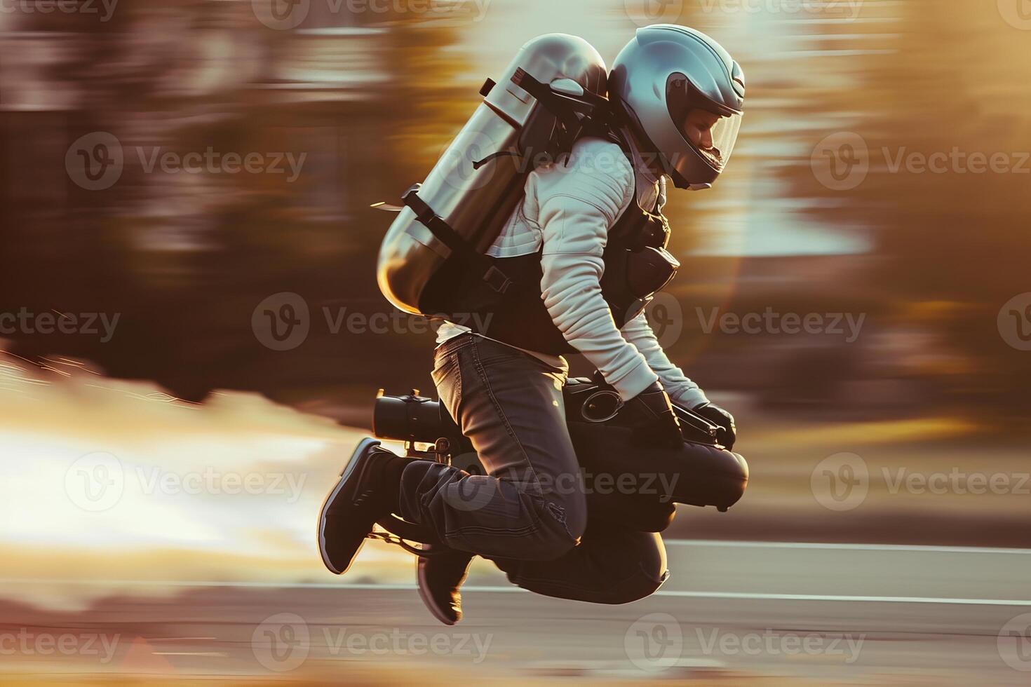 Pilot is flying with a jetpack over a road at sunset photo