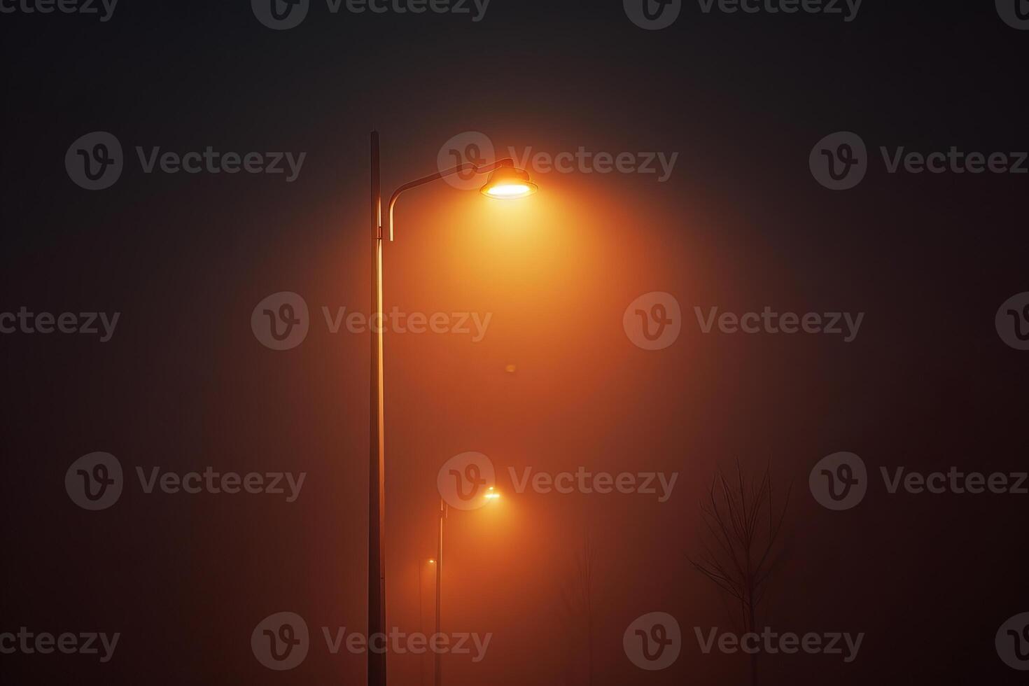 Street light illuminating foggy night creating warm glow photo