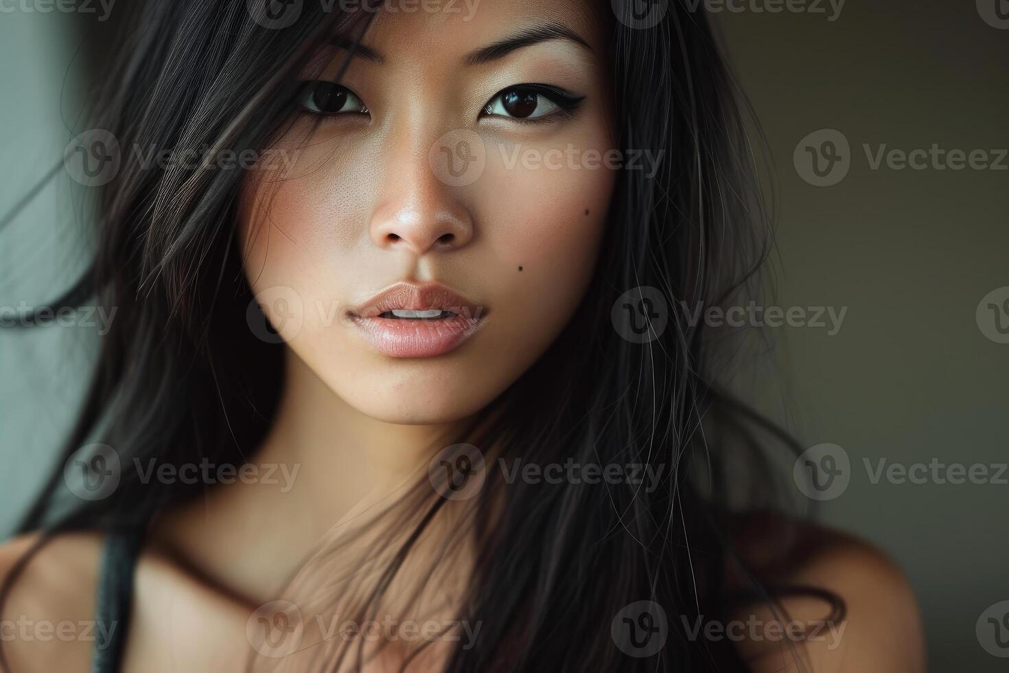 Serene beauty - close-up of young asian woman photo