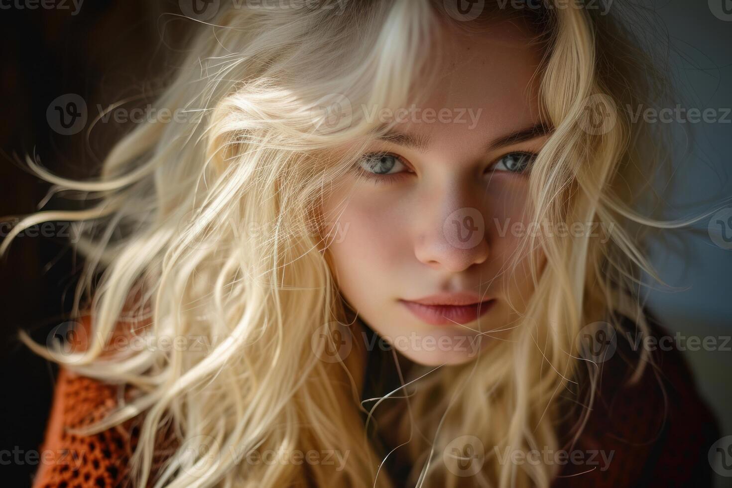 Serene blonde woman with intense gaze photo