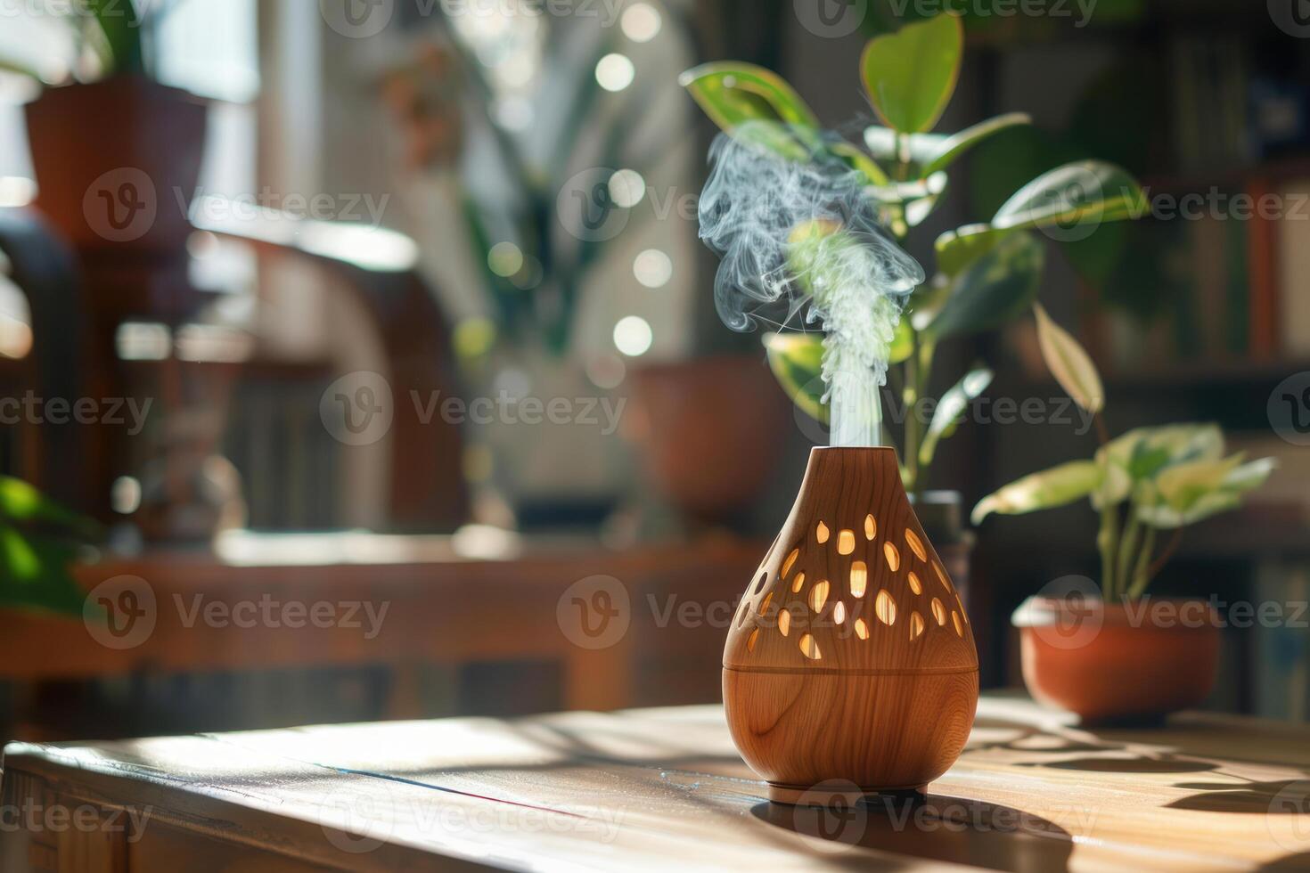 Aroma diffuser spreading smoke from essential oils in a cozy home environment photo