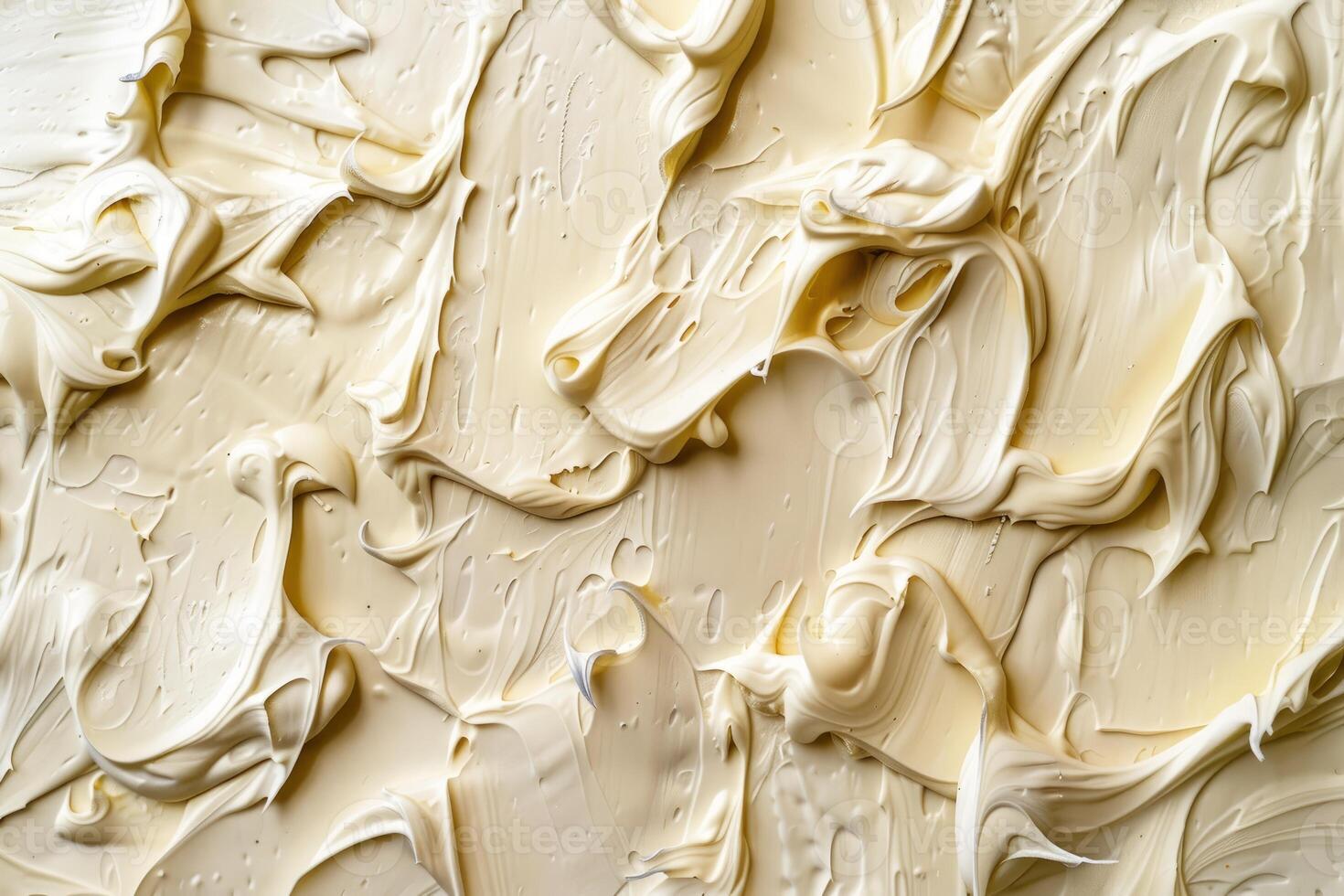 Highresolution image featuring a smooth and creamy beige texture with dynamic swirls photo