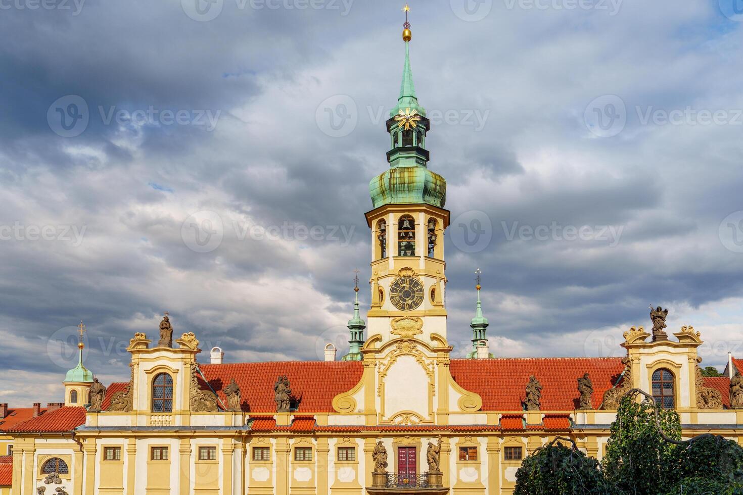 This captivating image features the historic architecture of a charming European city. An iconic clock tower stands over cobblestone streets, showcasing rich culture and breathtaking views for travelers. photo