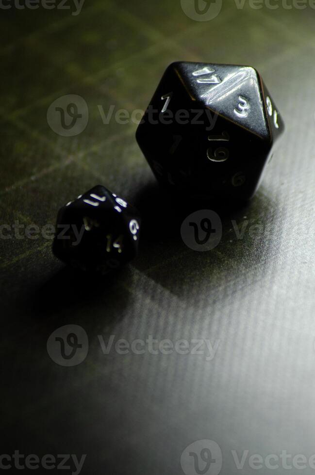 Black dice for role-playing and board games photo