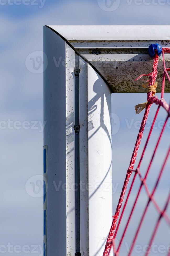 top corner of the goal of a football field photo