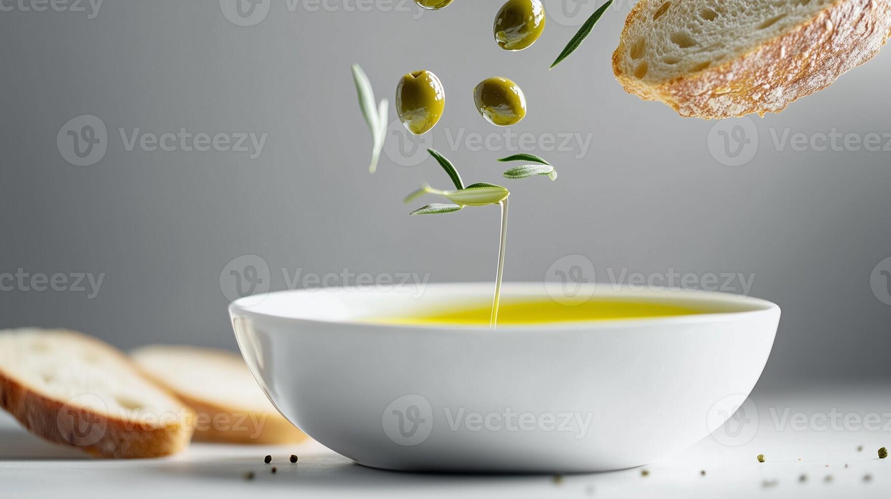 Fresh olive oil with floating olives and bread in motion on a clean background in a culinary concept photo