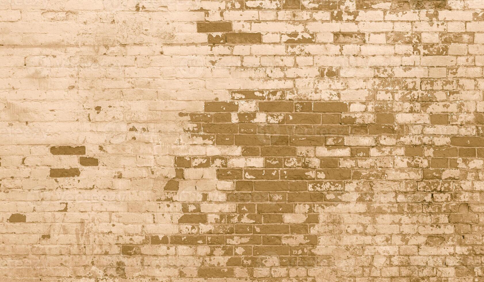 The background of the old beige brick wall for design interior and various scenes or as a background for interviews. photo