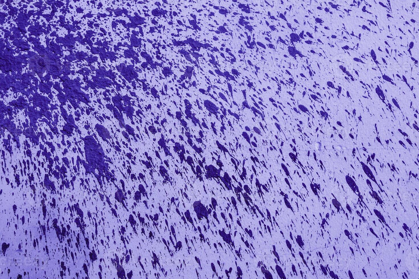 Texture of rough violet plaster. Architectural abstract background. photo