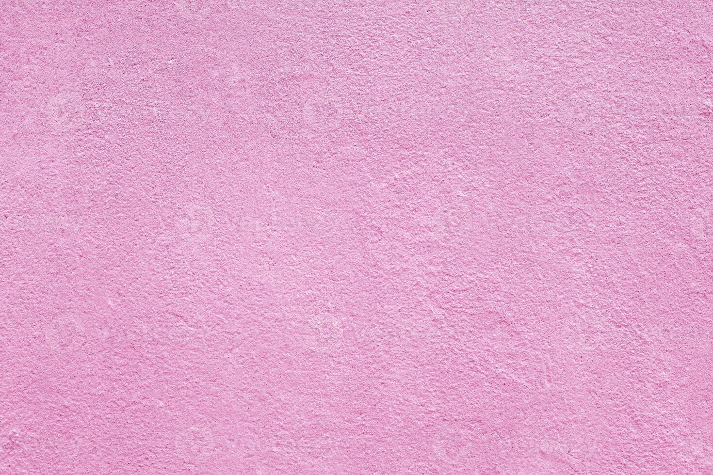 Texture of rough pink plaster. Architectural abstract background. photo