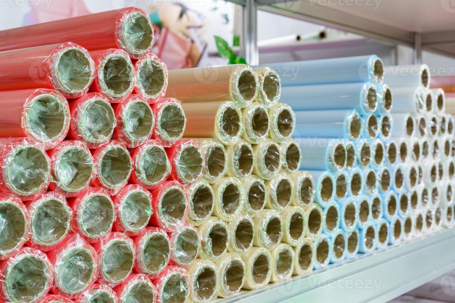 A roll of wrapping paper on a shelf in a store. photo