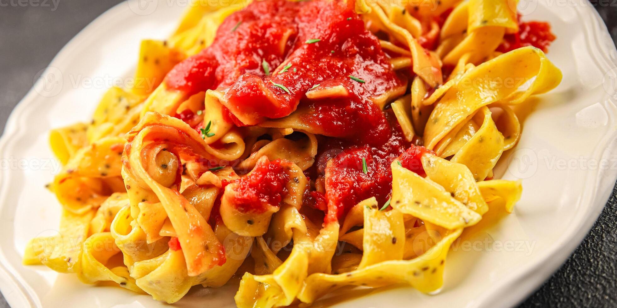 Pasta tagliatelle tomato sauce second course tasty food dish fresh delicious gourmet food background on the table rustic food top view copy space photo