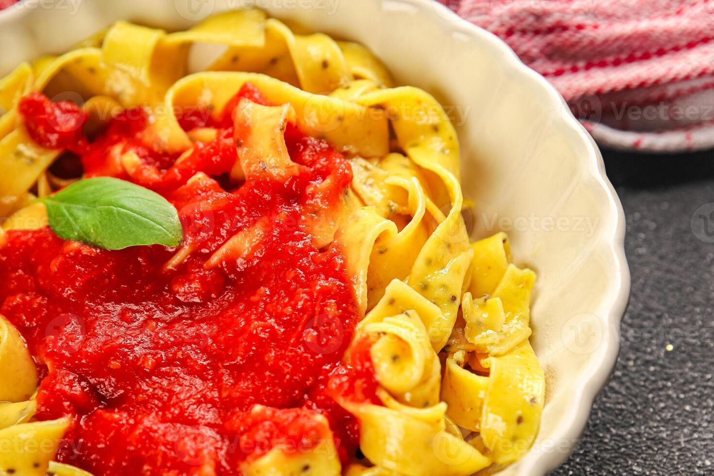Pasta tagliatelle tomato sauce second course tasty food dish fresh delicious gourmet food background on the table rustic food top view copy space photo