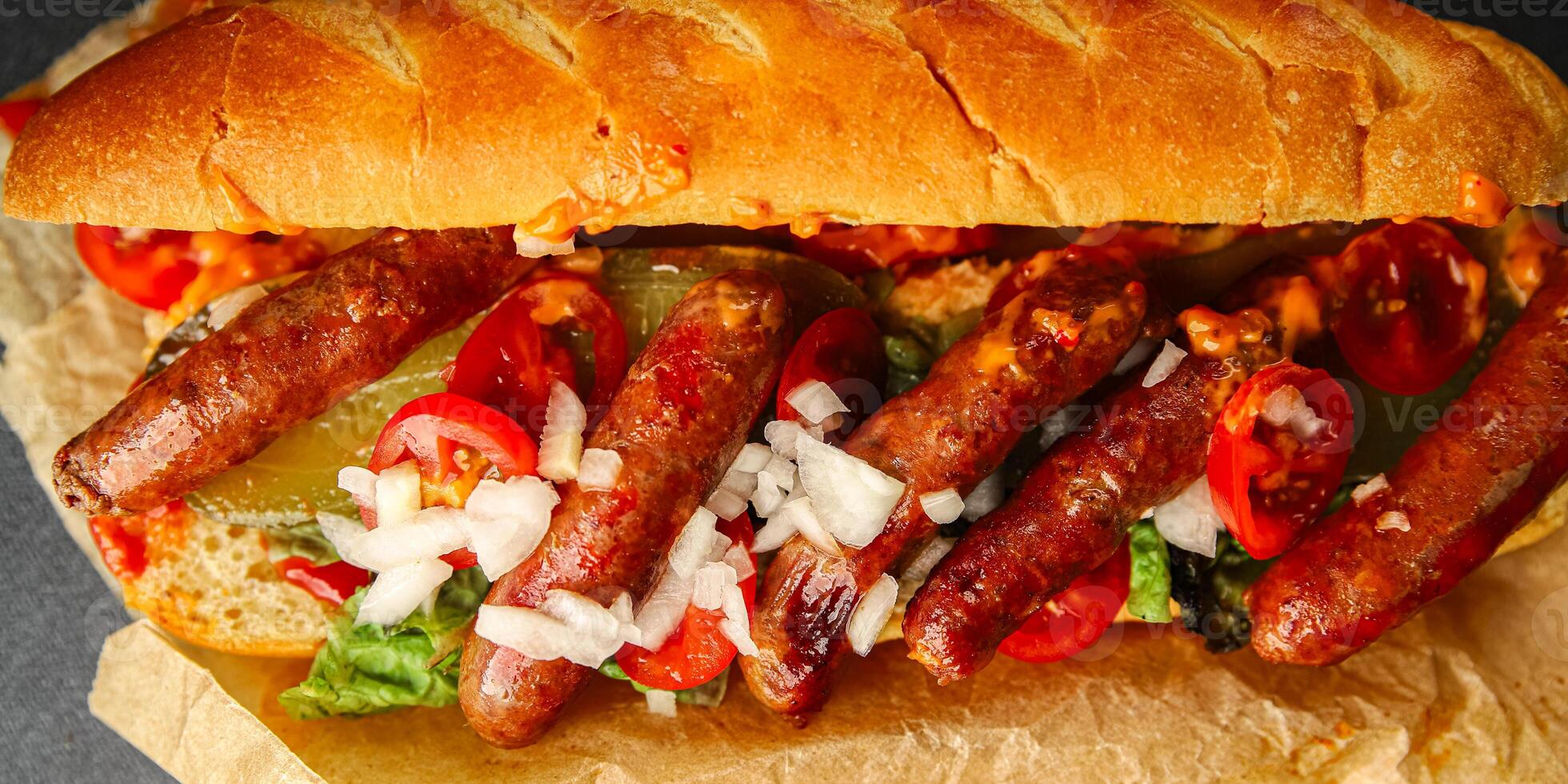 hot dog sausages, bun, greens, sauce fast food delicious food dish Fresh delicious gourmet food background on the table rustic food top view copy space photo