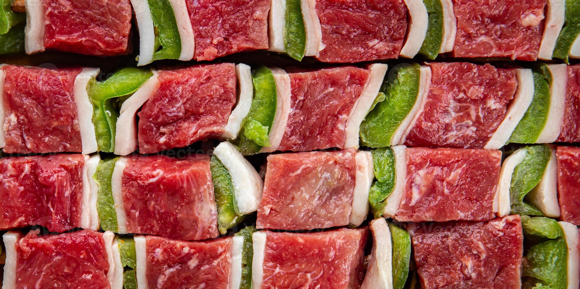 kebab raw meat vegetable pork, lard, pepper, vegetable dish fresh delicious gourmet food background on the table rustic food top view copy space photo