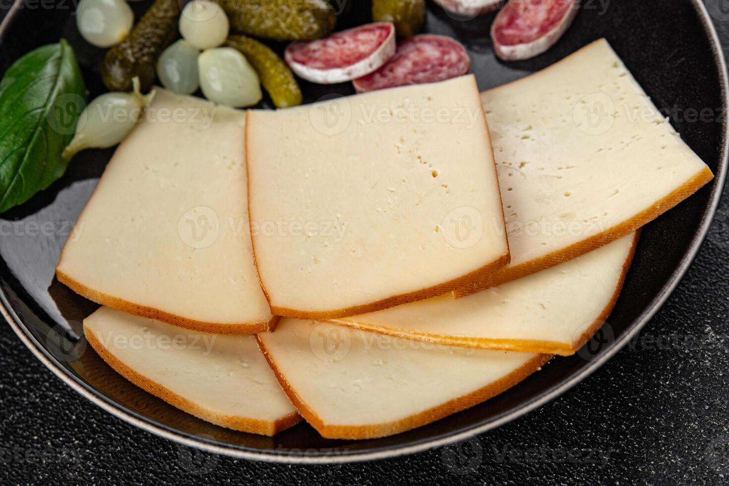 Raclette cheese tasty food dish fresh delicious gourmet food background on the table rustic food top view copy space top view photo