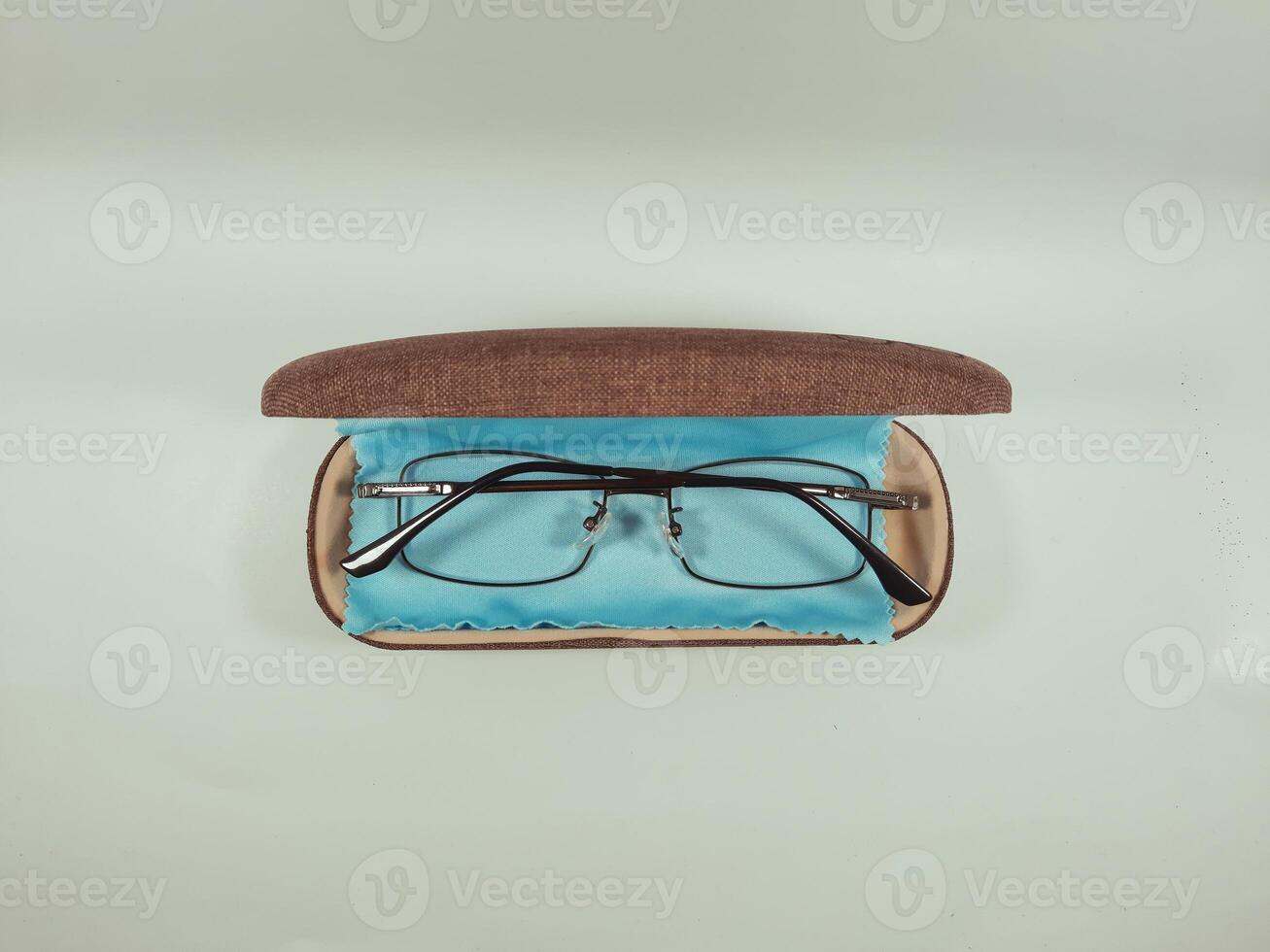 Reading glasses in the case, serving as an aid to reading and also as fashion photo