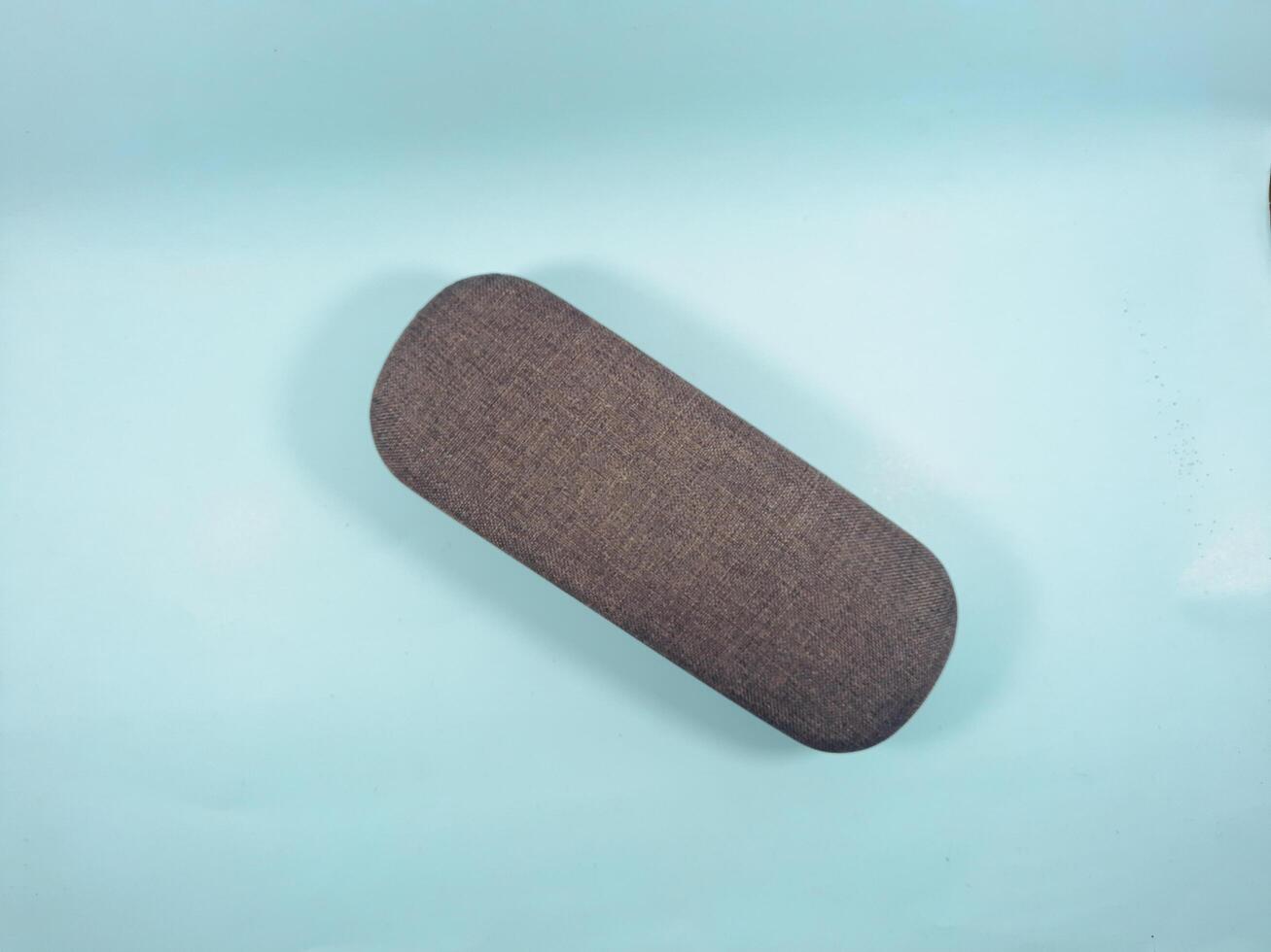brown reading glasses case, to protect the glasses when not in use. photo
