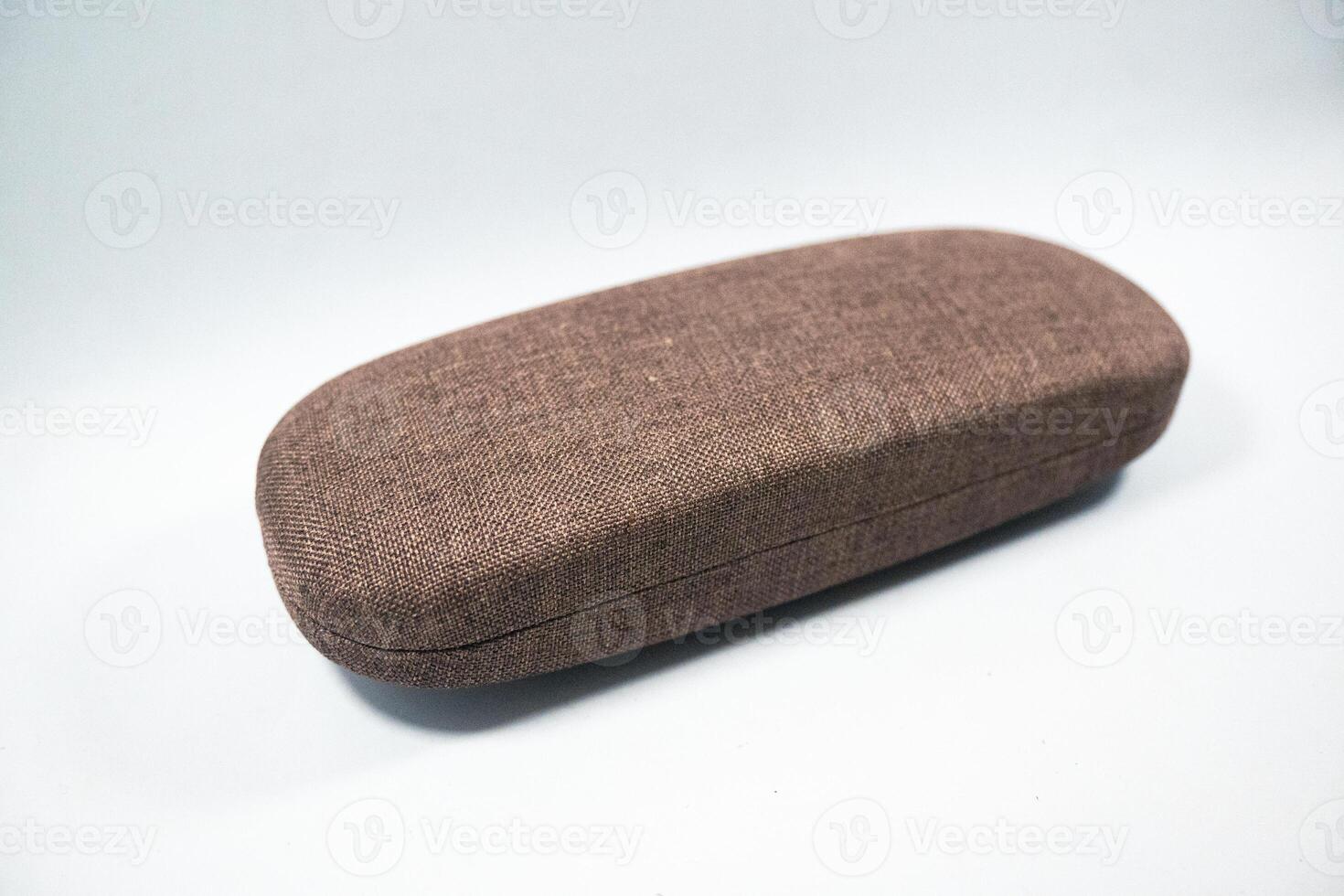 brown reading glasses case, to protect the glasses when not in use. photo