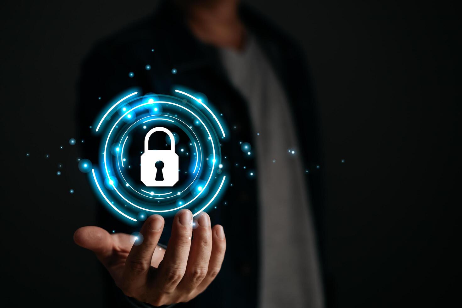 Cybersecurity and privacy protection network security computer and safe data concept. Businessmen protect personal data information from viruses on hand with virtual screen interfaces. photo