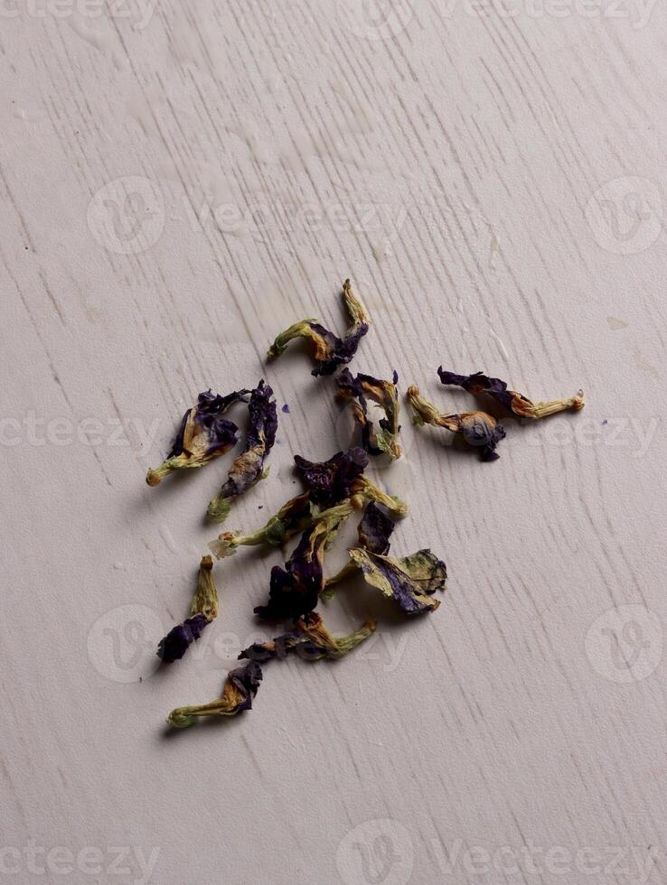 butterfly pea tea petal violet herbal antioxidant blue purple drink relax beverage photo business