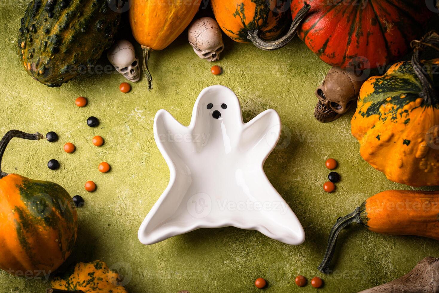 Halloween empty plate in shape of ghost photo