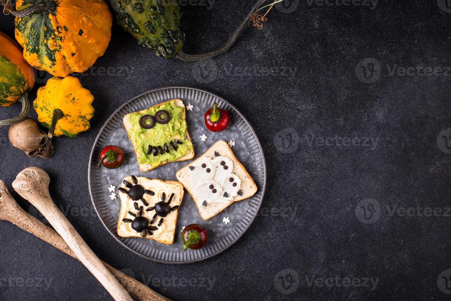 Halloween food for children, monsters toasts photo