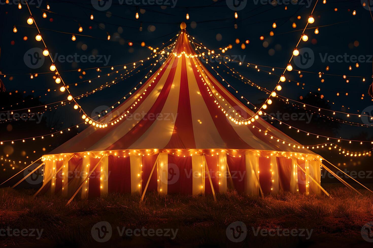 Stripes tent of circus evening with garland lights for show and childish entertainment. Circus canopy performance photo