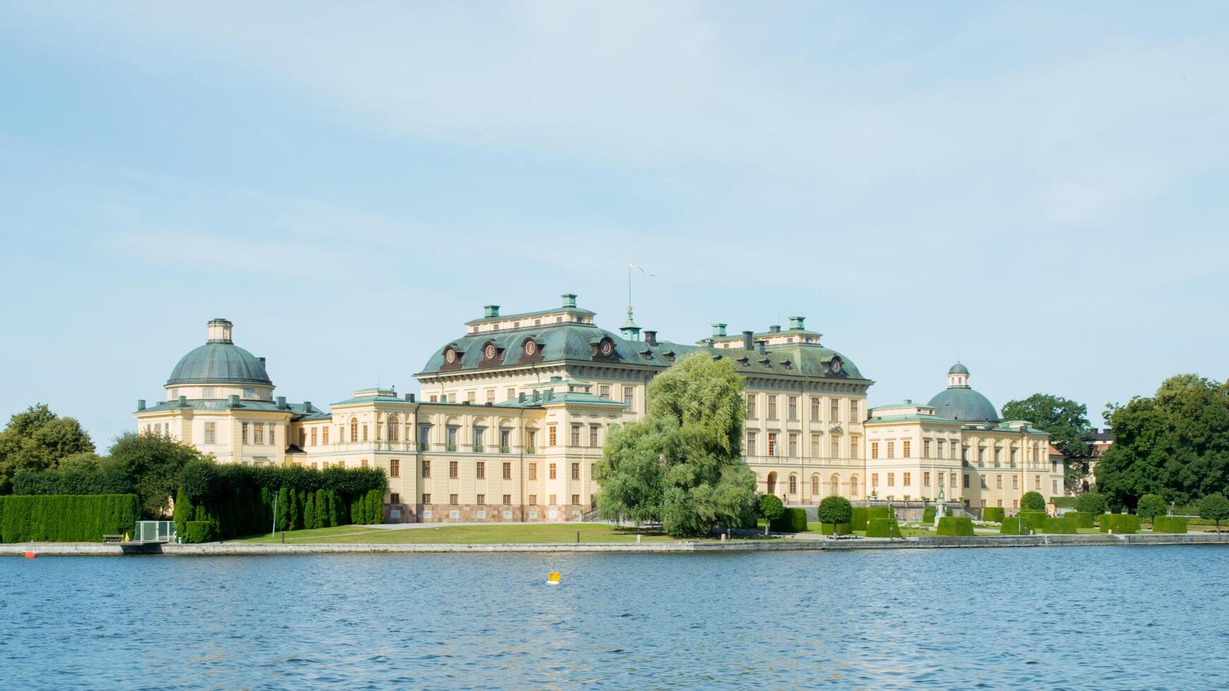 Beautiful view of Drottningholm palace, permanent home residence of Their Majesties the King and Queen of Sweden photo