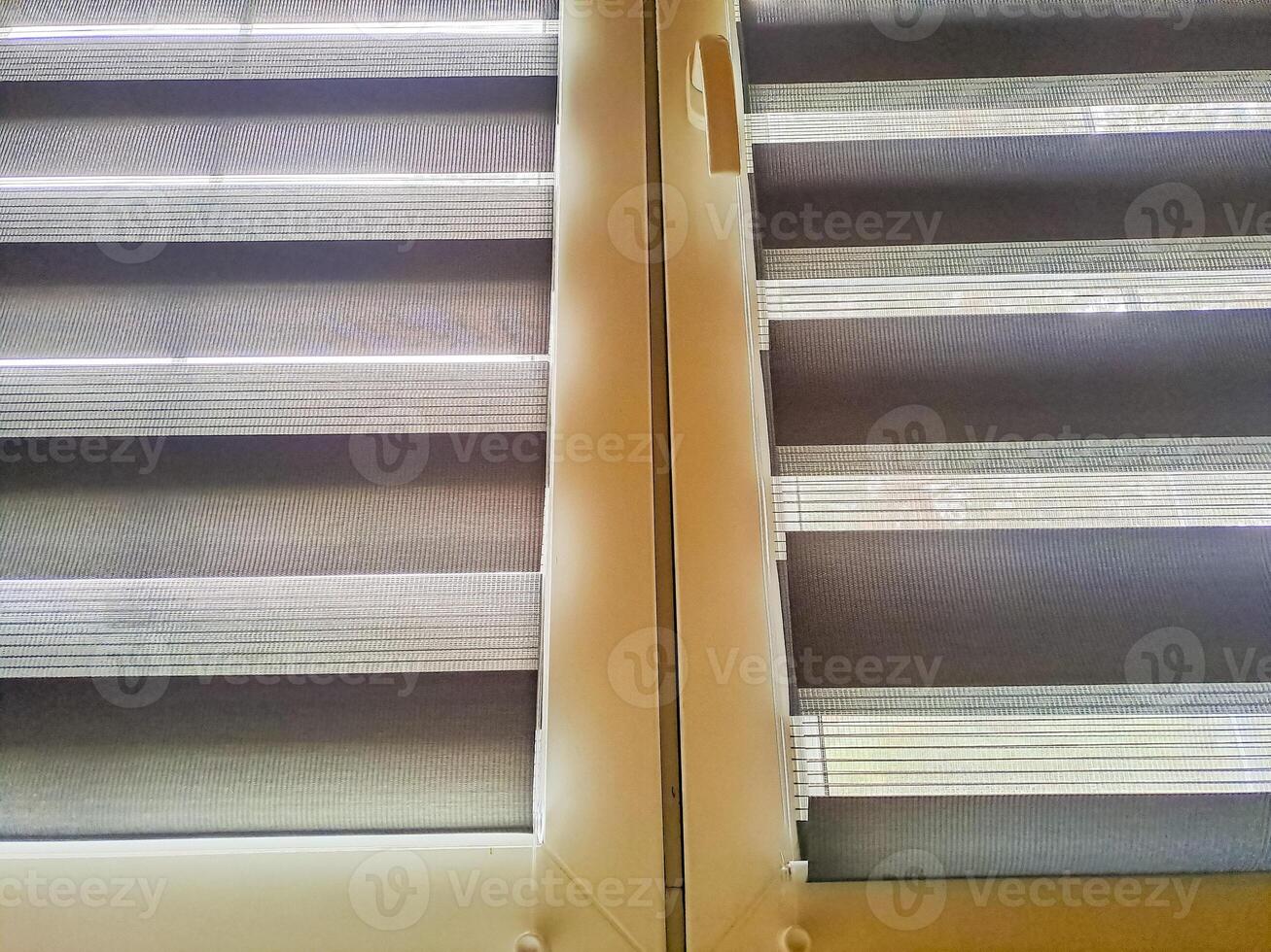 Window roller, duo system day and night. Dual roller shades beige color close-up photo