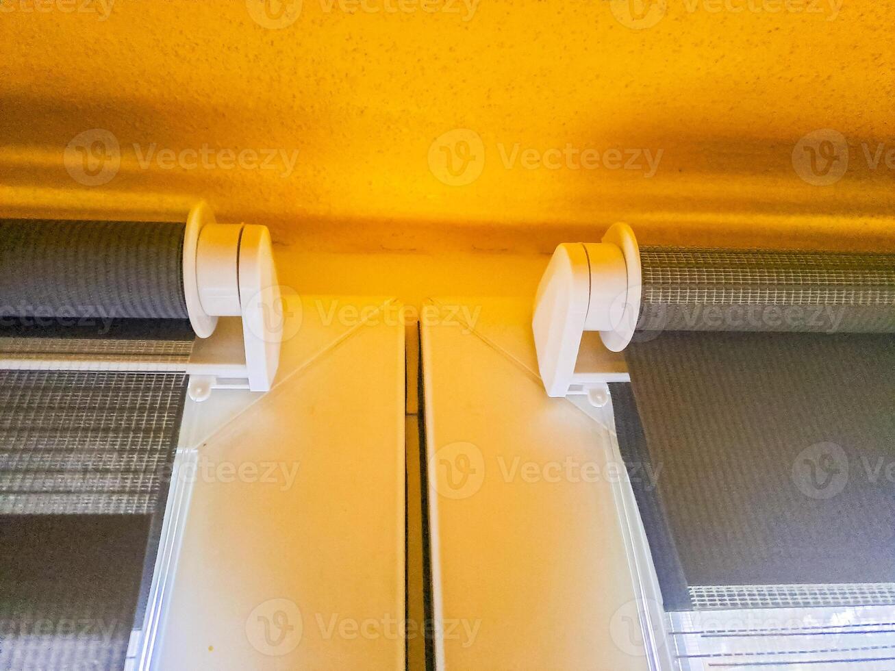 Window roller, duo system day and night. Dual roller shades beige color close-up photo