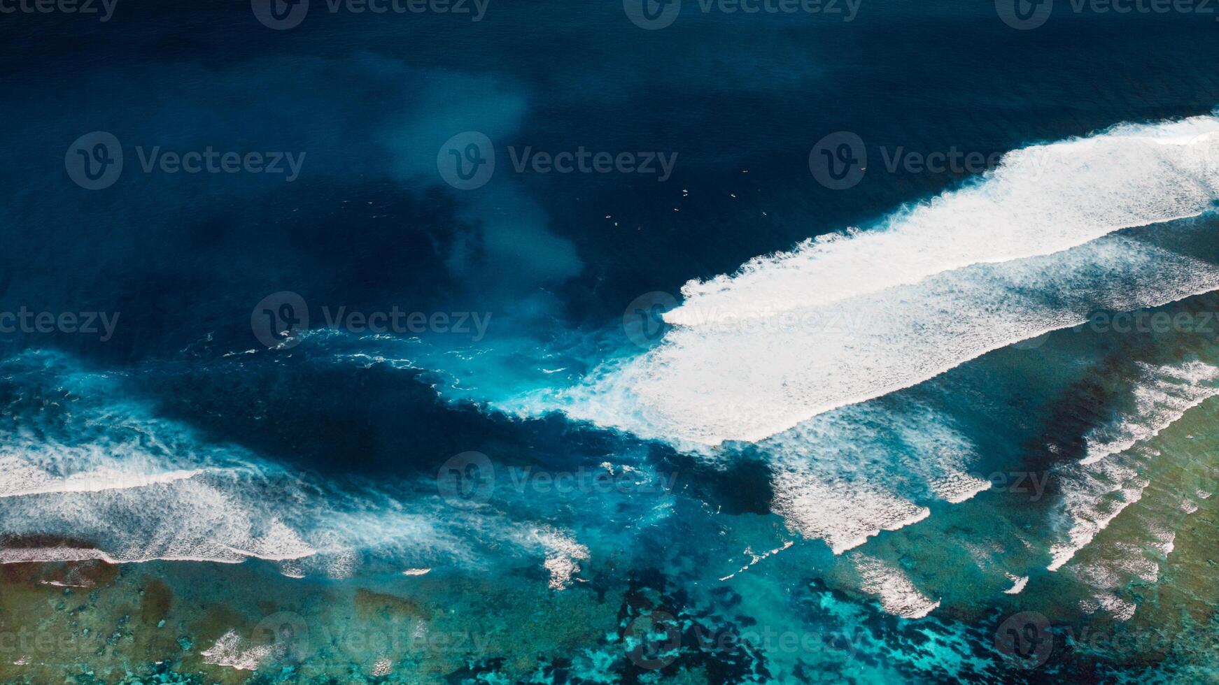Coastline with ocean waves and current canal and Green bowl beach, drone view photo