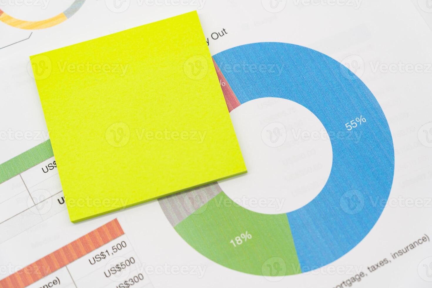 Blank green sticky note on graph background. Copy space. photo