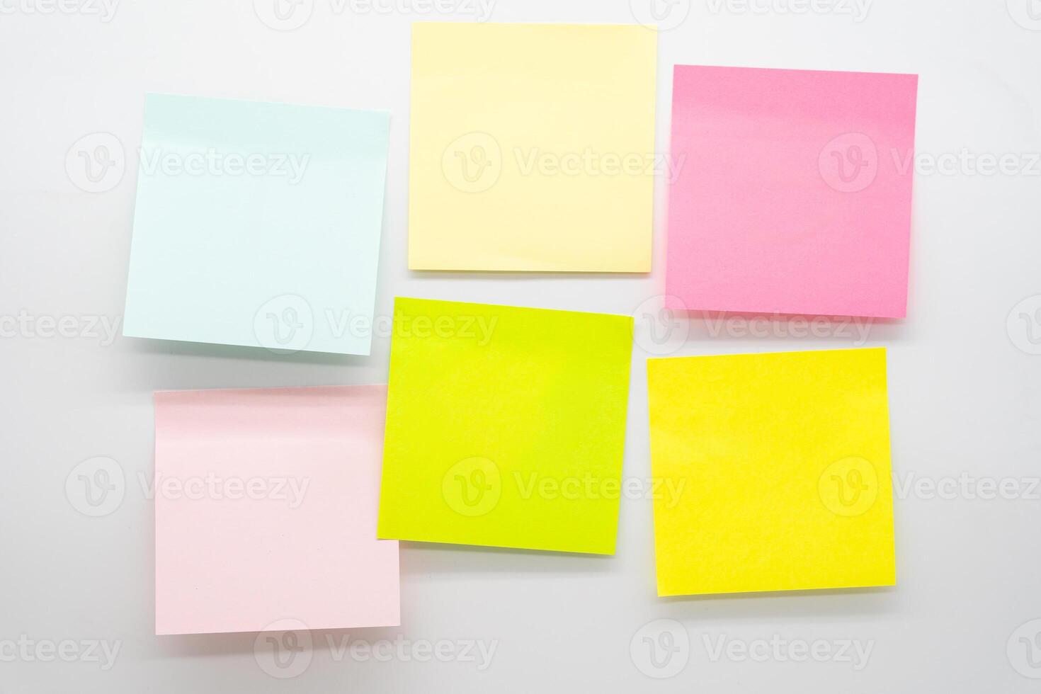 A different colored sheets of note papers or sticky note. blank Sticker notes. Mockup sticky Note Paper. empty sheets for notes on board. photo