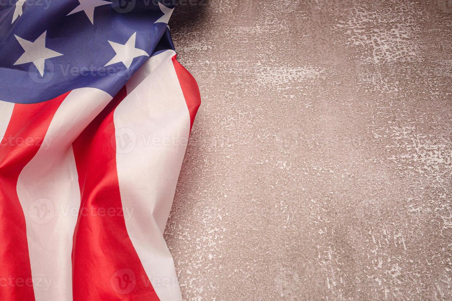 American flag on a cement background with copy space photo
