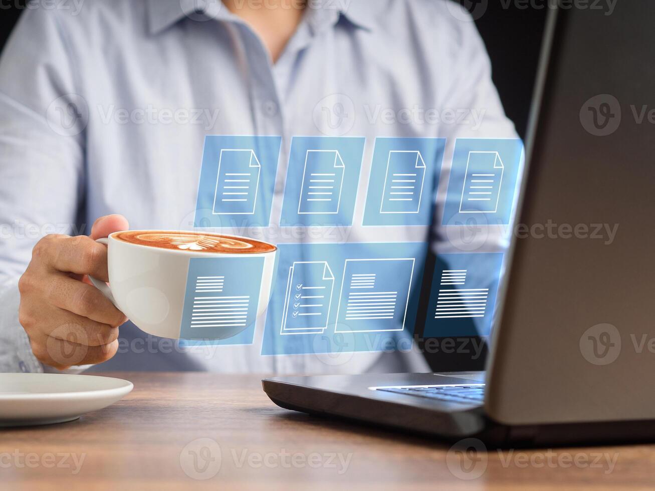 Businessman reading digital documents on a virtual screen photo