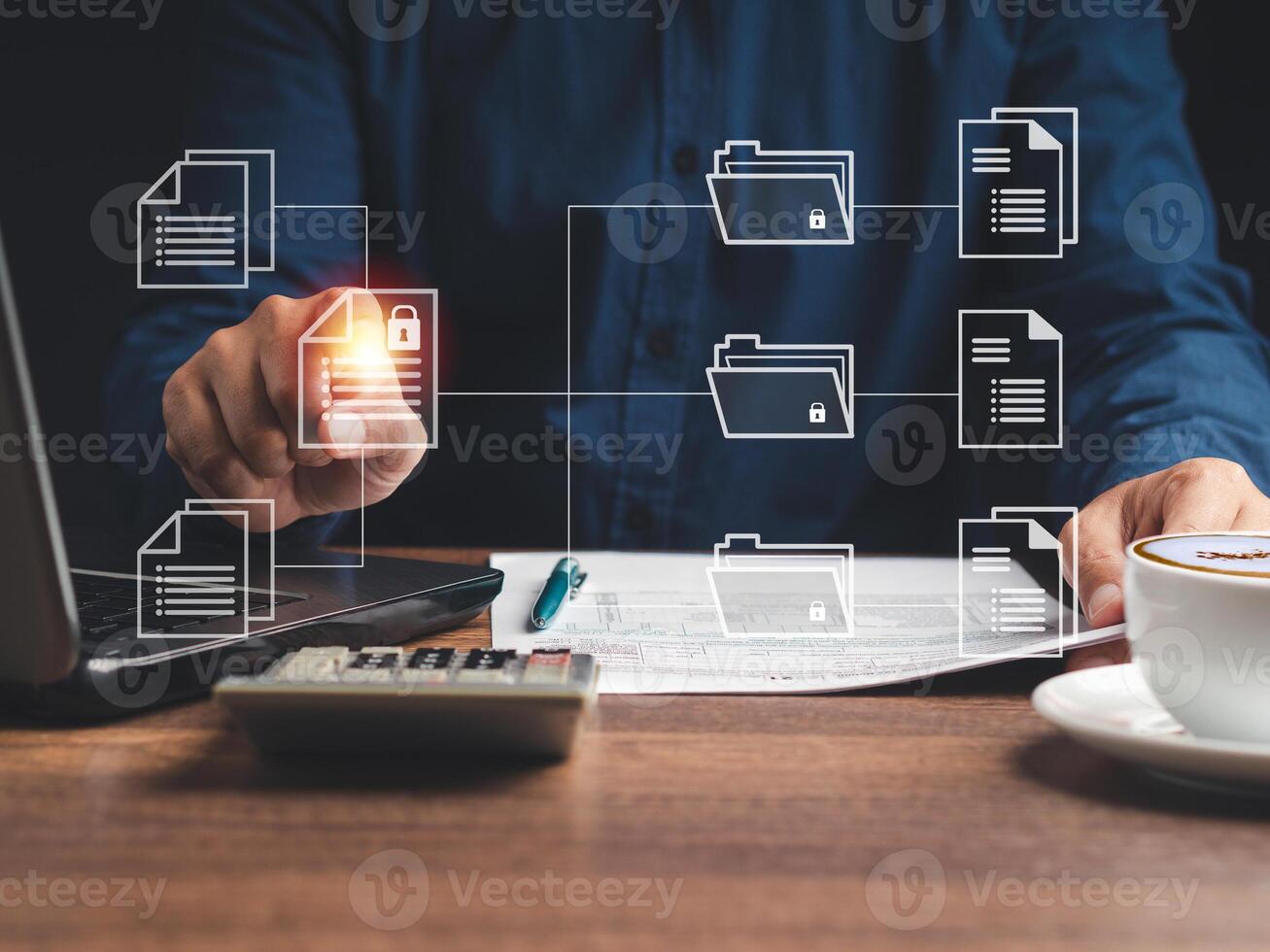 Midsection of hand businessman touch sheets of a document on a virtual screen while sitting in the office photo