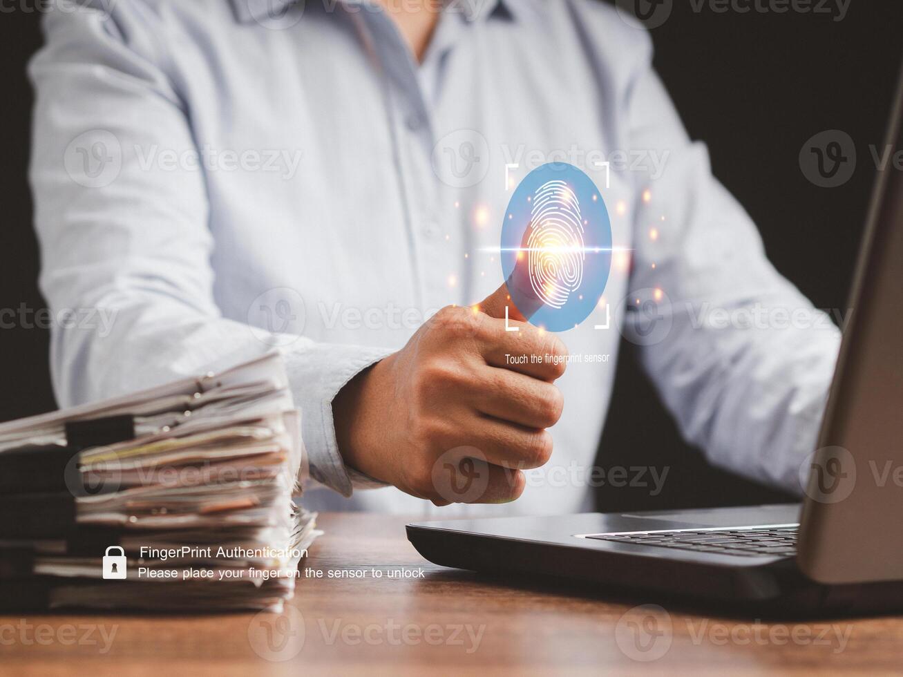 Young man scans fingerprint biometric identity to access personal data photo