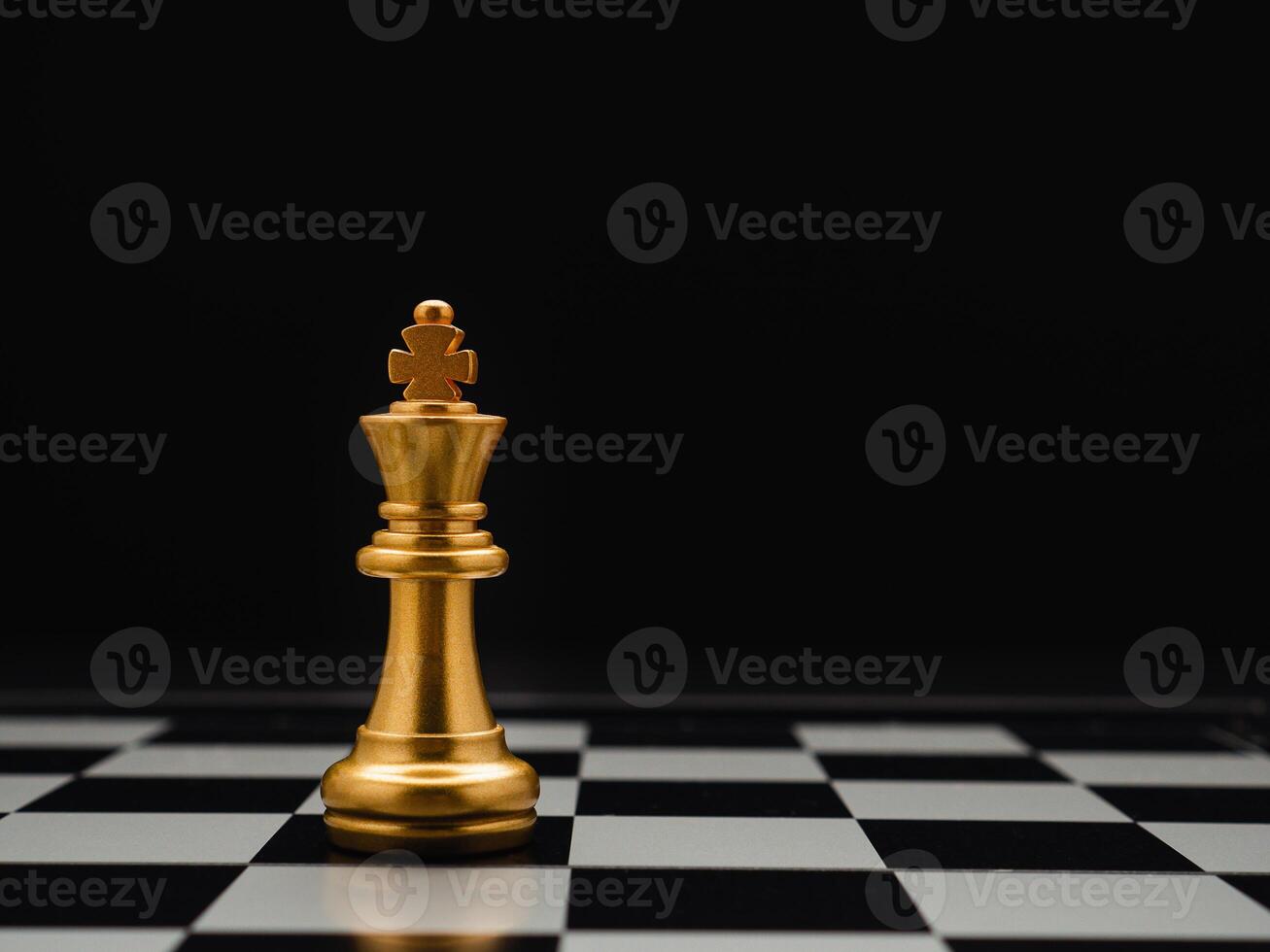 Chess piece on board game planning and competition on black background photo