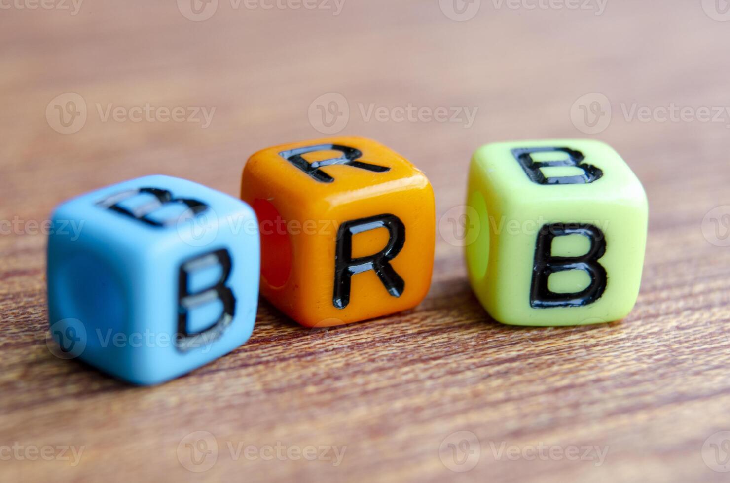 Close up view of BRB text represent Be Right Back on wooden. Taking a break concept photo