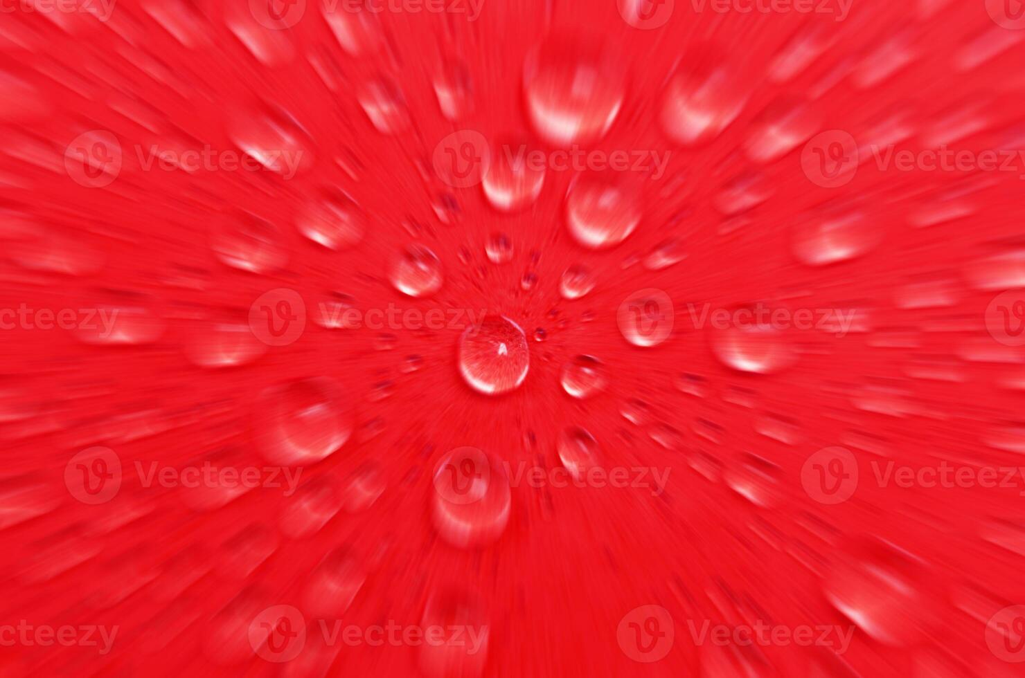 Top view of water droplets on red cover background with zoom effect. Suitable for wallpaper photo