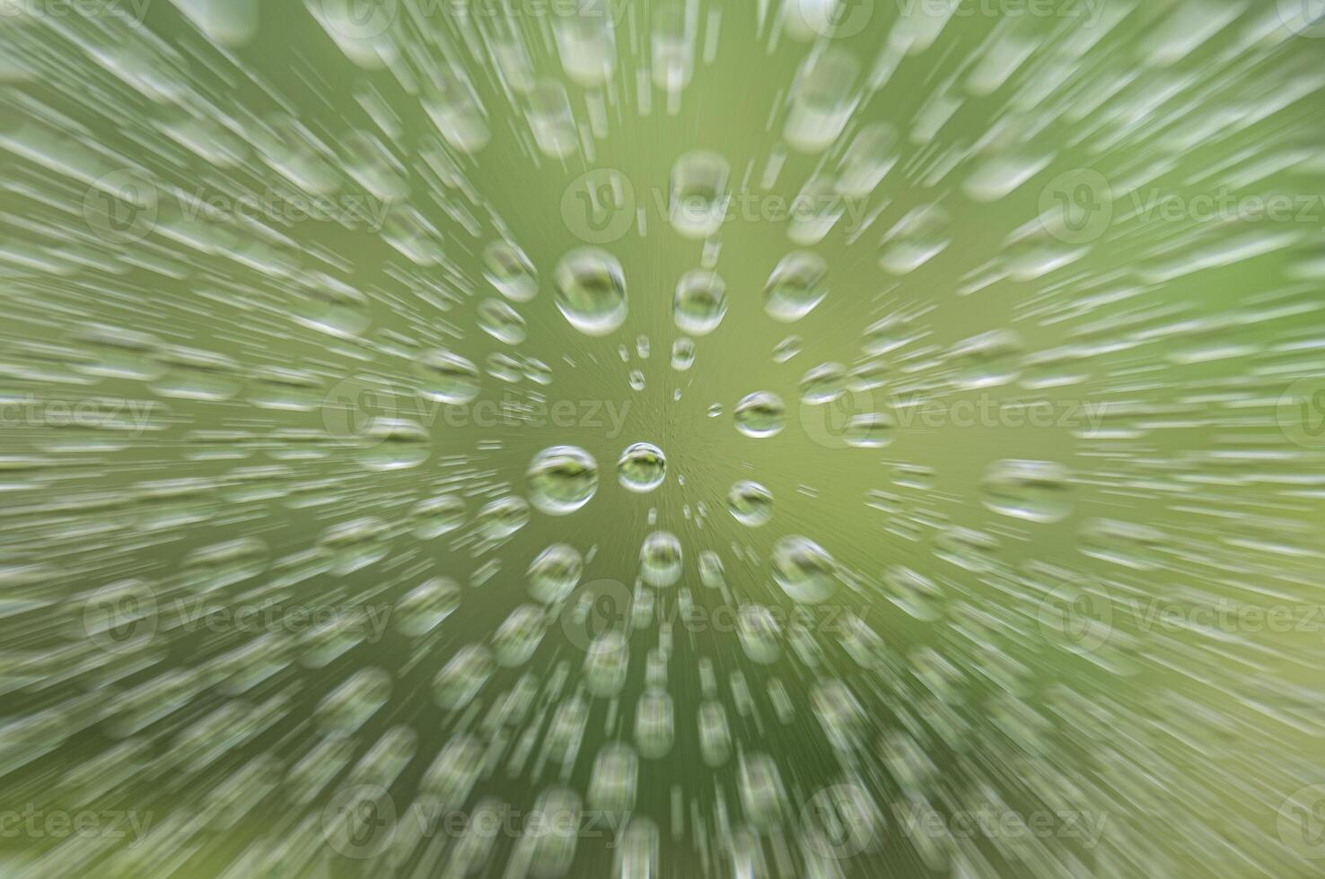 Clear raindrops on clear glass with zoom effect. Raindrop concept photo