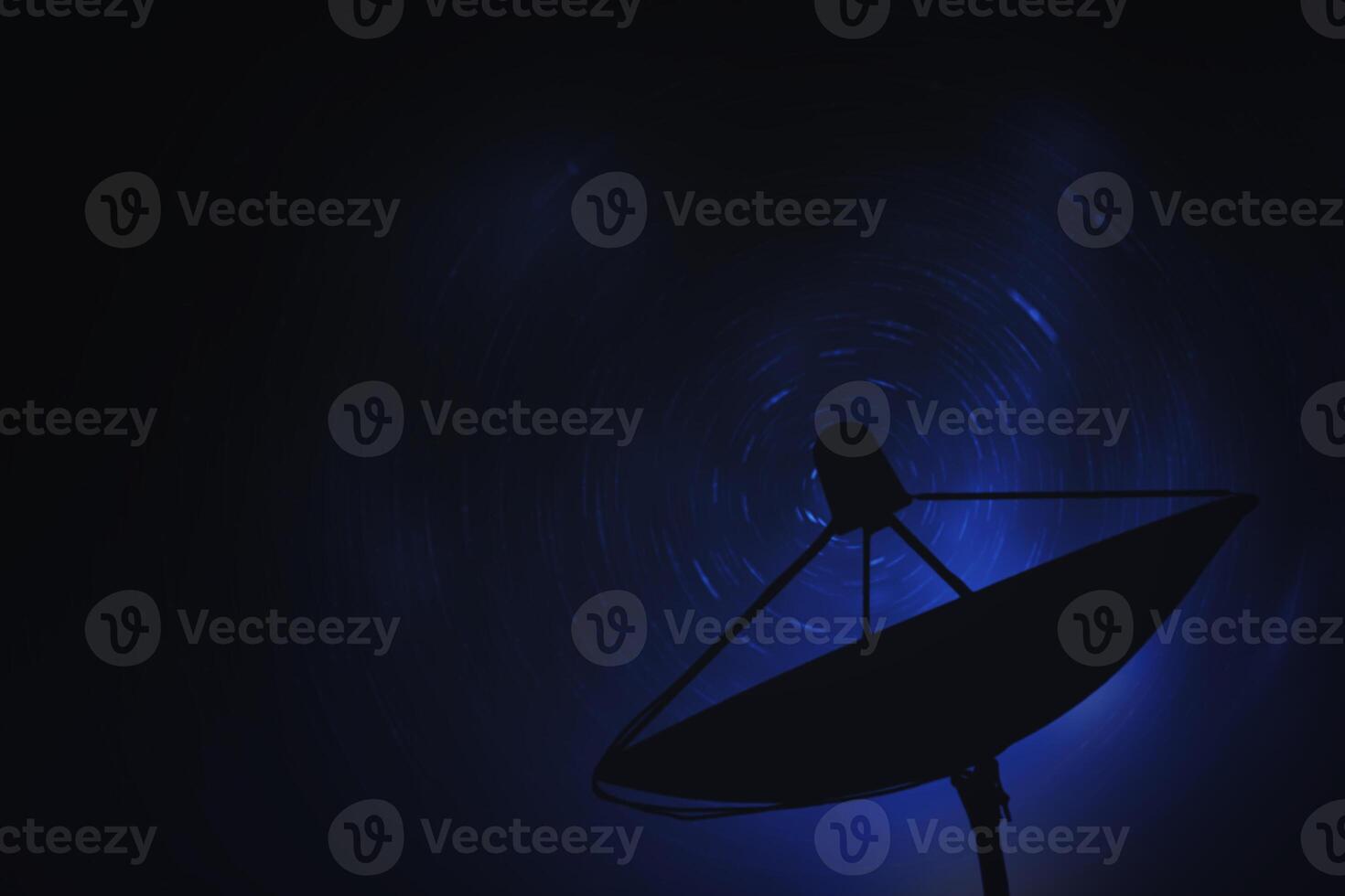 silhouette satellite dish on night sky background photo