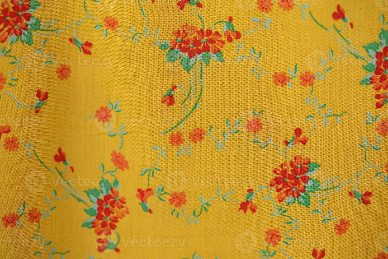 Textile pattern with floral ornament on fabric. photo