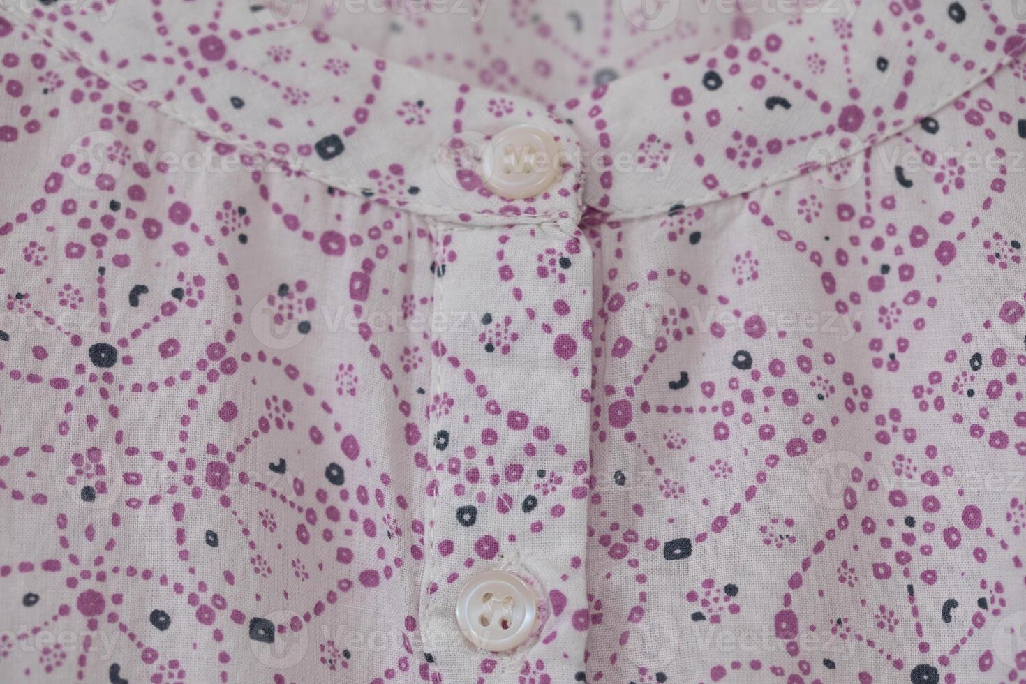 Textile pattern with floral ornament on fabric. photo