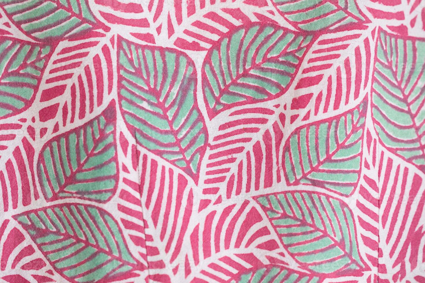 Textile pattern with floral ornament on fabric. photo