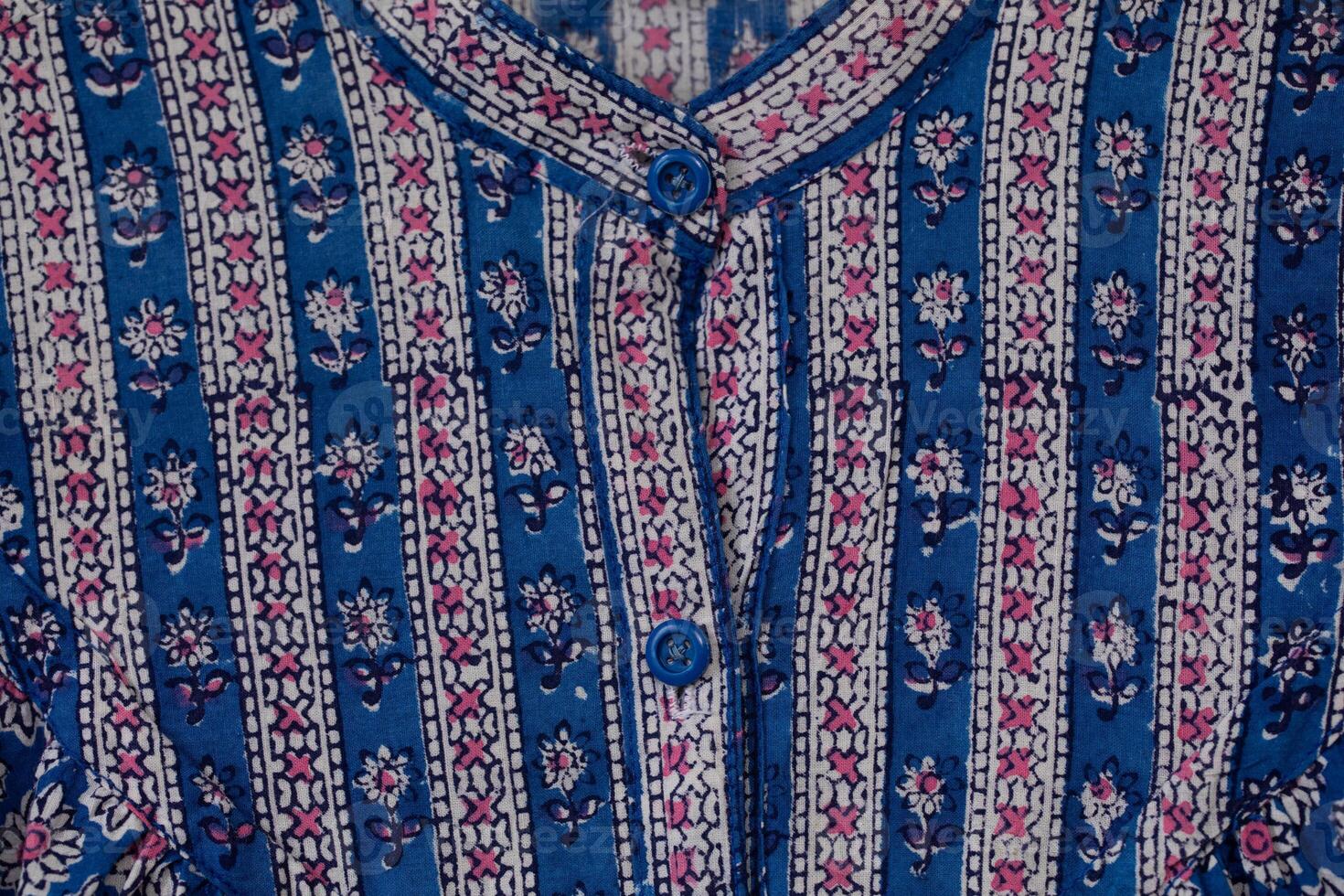 Textile pattern with floral ornament on fabric. photo